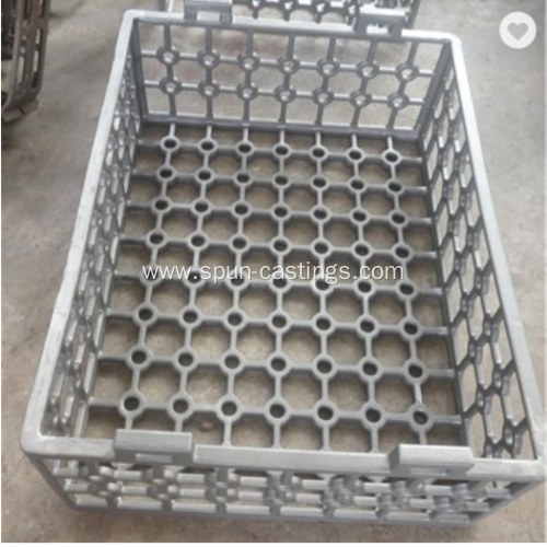 Heat resistant cast charging baskets